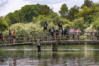 Oxford students jumping into the Thames at Port Meadow in Oxford, Oxfordshire, England, United