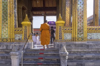 Wat Phra Kaeo temple, royal palace. Royal chapel with Buddhist monks and novices. Bangkok,