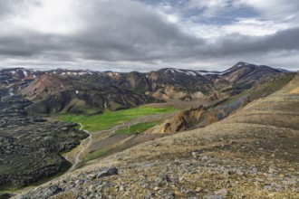 View from Sudurnamur peak, mountains, river and lava field, volcanic landscape, Landmannalaugar,