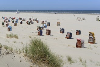 Colourful beach chairs on the beach, blue sky, North Sea, Island of Juist, East Frisian Islands,