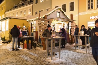 Mulled wine stall at the Christmas market in Schneeberg in the Ore Mountains, Saxony, Germany,