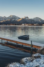 Frosty morning atmosphere during sunrise at Lake Hopfensee in the Allgäu in Bavaria, Germany,