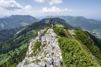 Climber on a climbing tour, climber on a mountain ridge, alpine climbing, crossing the Kampenwand,