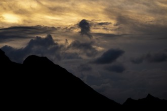 Summit in the morning light with dramatic clouds, Lech, Lechquellengebirge, Vorarlberg, Austria,