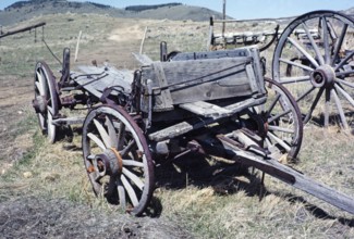 Nevada City historic ghost town, Montana, USA old broken down wooden wagons