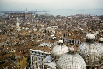 Roofs of buildings, church domes and towers, Venice, Italy 1957