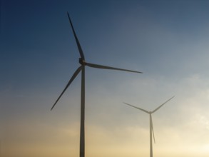 Minimalist view of wind turbines in early sunlight, Rems Valley, Baden-Württemberg, Germany, Europe