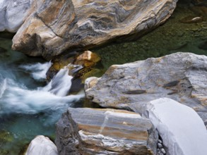 Clear water and rock formations in the Verzasca River, near Lavertezzo, Verzasca Valley, Valle