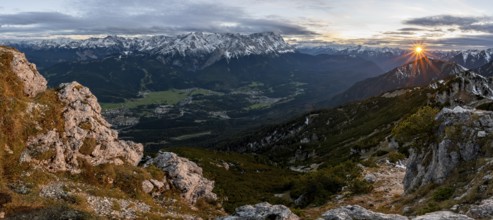 Mountain panorama with Wetterstein mountains, mountain landscape with sun star at sunset, at the