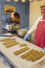 Person making traditional nougat, Ortygia, Syracuse, Sicily, Italy, Europe