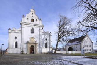 Monastery church of St Peter and Paul and rectory in winter with snow, Oberelchingen, Elchingen,