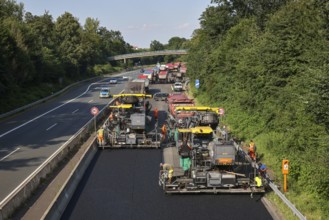 Essen, North Rhine-Westphalia, Germany, Road construction, Asphalt pavers and road rollers lay new,