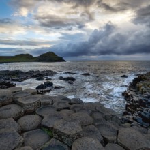 Rocky coast with basalt columns, coastline, dusk by the sea, Giant's Causeway, Giants Causeway,