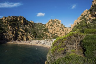 Red rocks and picturesque beach, Spiaggia di Cala li Cossi, Costa Paradiso, Sardinia, Italy, Europe