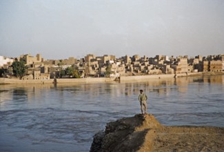 River Indus with a view of the historical buildings of the city of Sukkur, Sindh, Pakistan 1962