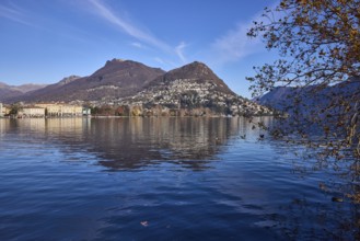 Mountains, lake, shore, general development, tree, reflections on the water surface, blue sky, Lake