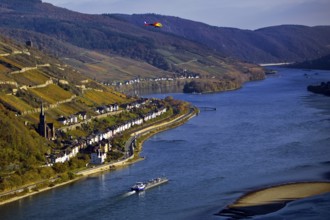 Elevated view of the Rhine and Lorch from Bacharach with barge and helicopter, Upper Middle Rhine