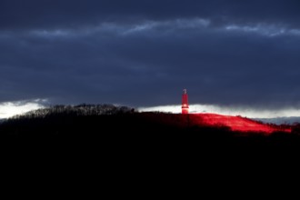 Artwork Illuminated at night with red illuminated slagheap Rheinpreussen by Otto Piene, Moers, Ruhr