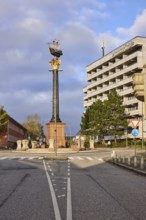 Granite column with metal sculpture of Störtebeker's cog, roundabout between Borstelmannsweg and