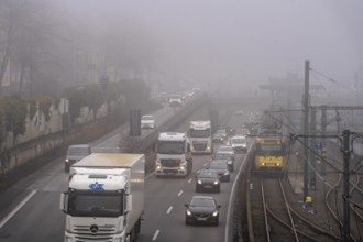 Dense fog, with visibility sometimes less than 100 metres, A40 motorway, city passage in Essen,