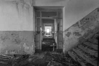 Lost Place, An abandoned and destroyed building corridor with crumbling walls, Lastovo, Neretva,