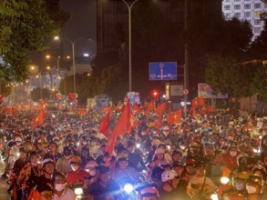 Football fans celebrate in the streets, victory in Asean championship against Thailand, many