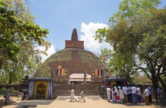 Sri Lankan pilgrims at the Abhayagiri Stupa in the holy city of Anuradhapura, North Central