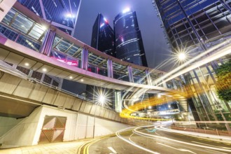 Hong Kong at night traffic with skyscrapers in Central district in Hong Kong, China, Asia