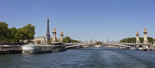 View across the Seine to the bridge with the Eiffel Tower in the background, Paris