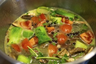 Vegetable soup, or vegetable stock, is cooked with various vegetables, which are slowly simmered