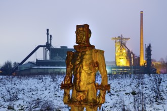 People made of iron, multi-part iron sculpture by Zbigniew Fraczkiewicz in front of the