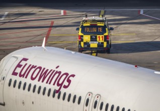 Follow Me vehicle, pilot vehicle, apron supervisor, marshaller, directs an aircraft to its parking