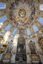 Interior of the baroque church with ceiling paintings and altar, Ettal Abbey, baroque Benedictine