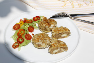 Swabian cuisine, meatballs wrapped in almonds, mixed minced meat, meatballs filled with cheese,