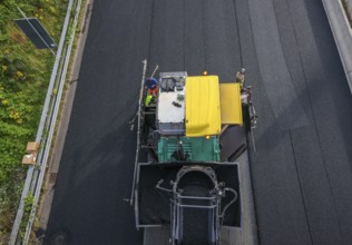 Essen, North Rhine-Westphalia, Germany, Road construction, Asphalt pavers and road rollers lay new,