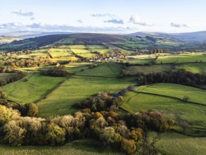 Farms over Trecastle from a drone at sunset, Brecon Beacons National Park, Powys, Wales, England,