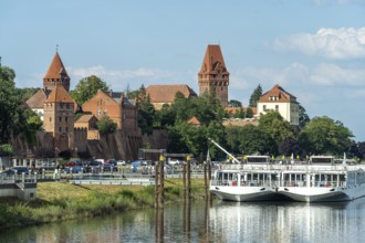 City view with cruise ships on the river Tangier City wall and castle in Tangermünde,