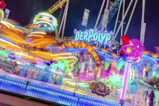 Polyp ride at night with colourful lights, Cannstatter Wasen, Bad Cannstatt, Stuttgart,