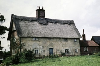 Old East Anglian mud house, historic thatched country house at an unspecified location, probably