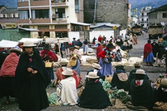 Indigenous market traders on the street, Ambato market, Ecuador, South America, 1962, South America