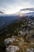 Mountain panorama, mountain landscape with sun star at sunset, at the summit of the Kramerspitz, in