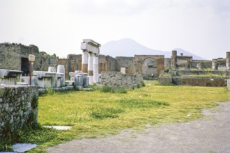 Roman ruins Archaeological Park of Pompeii, Naples, Italy, Europe 1967 with Mount Vesuvius volcano