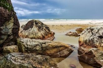 Rocky beach in Serra Grande on the southern coast of Bahia, Serra Grande / Uruçuca, Bahia, Brazil,