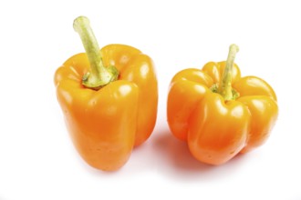 Two yellow sweet peppers isolated on white background. closeup