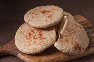 Pita bread, stack, on the table, no people