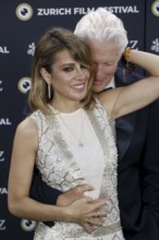 Richard Gere with woman Alejandra Gere at the premiere of Wisdom of Happiness, A heart-to-heart