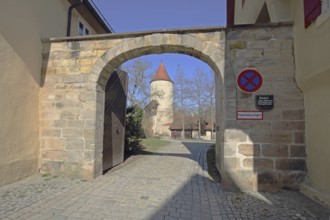 Archway of the historic municipal building yard with digestion tower, Dinkelsbühl, Middle