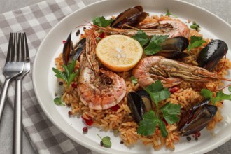 Seafood paella, shrimp and mussels risotto, rice, homemade, top view, no people