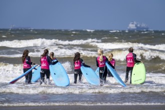 Course for surfers, surfing beginners, on the beach of Scheveningen, Netherlands