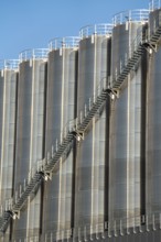 Stainless steel tanks of a large silo facility in Duisburg inland harbour, Duisburg-Neuenkamp, for